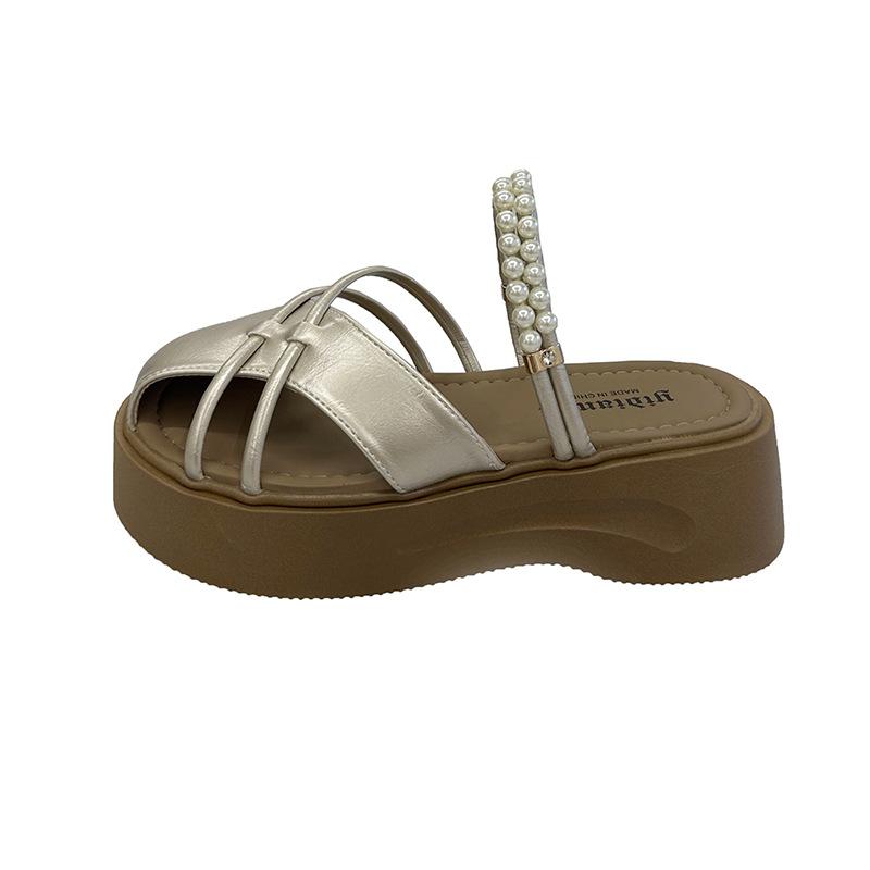 

Thick-bottomed fairy wind bag head half slippers female 2025 new summer wear lazy one pedal pearl cool slippers female 40 шампанського