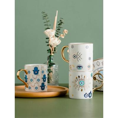 Kreative türkische blaue Teufelsauge-Keramiktasse, goldene Keramik-Kaffeetasse, Wassertasse fürs Büro, Frühstücksmilch, originelle Tassen, Geschenke für Paare