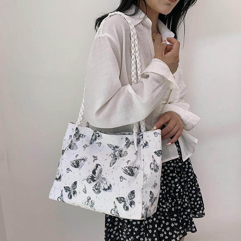 Geantă de umăr cu un singur lanț pentru studenți, cu capacitate mare, la modă, în clasa, versiunea coreeană, cu fluture, la modă și frumoasă