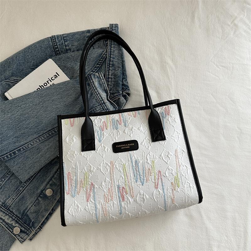 Stylish portable shoulder bag, commuting beautiful large-capacity canvas bag, simple 2025 new women's bag, foreign style tote bag