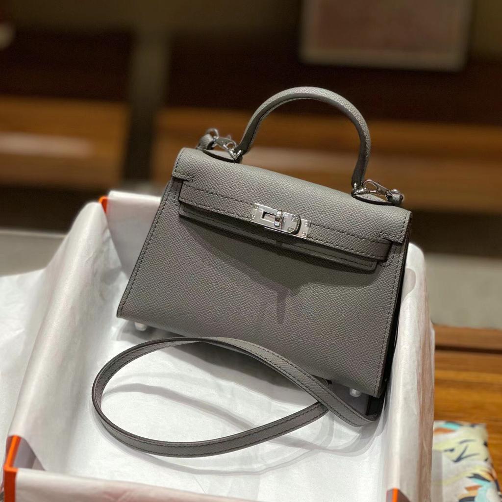 Grenzüberschreitende Hersteller Großhandel Damenhandtaschen 2023 neue Handtaschen aus Leder mit Palmenmuster tragbare Schulter-Umhängetaschen Damenhandtaschen große Kapazität