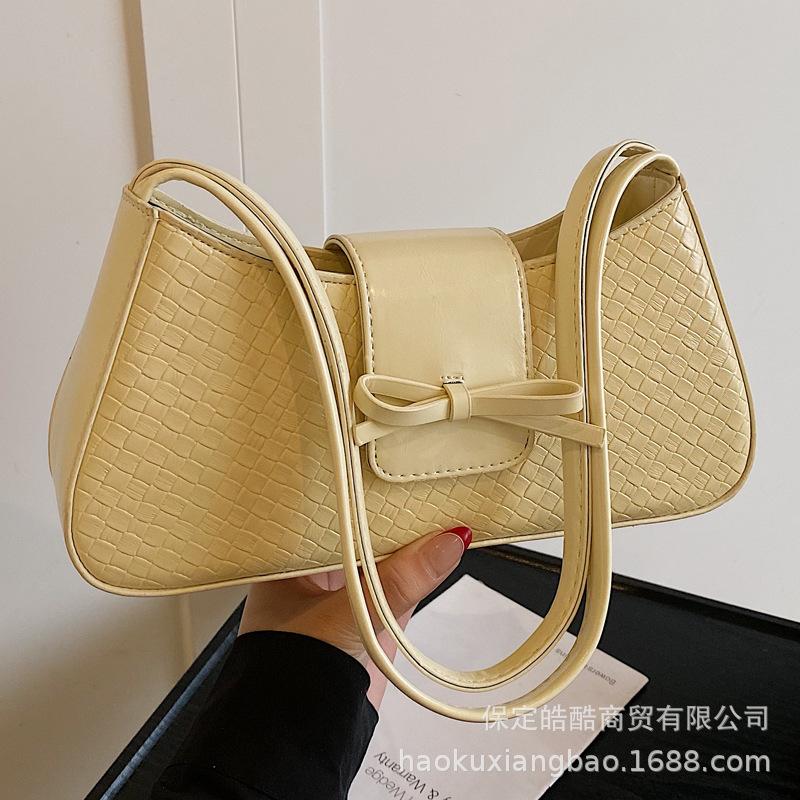 

Premium sense niche bag women s 2025 new spring and summer versatile French woven portable shoulder bag underarm small square bag жёлтый