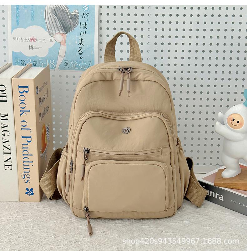 Schoolbag spot wholesale simple fashion backpack high sense niche women outdoor travel commuter small bag