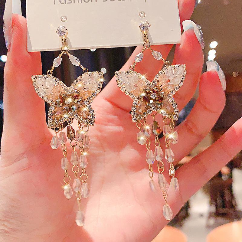 

Серьги-бабочки с циркониевой глазурью и бахромой, легкая роскошь, изысканные серьги с темпераментом, нишевая мода, серьги с высоким чувством стиля, женские