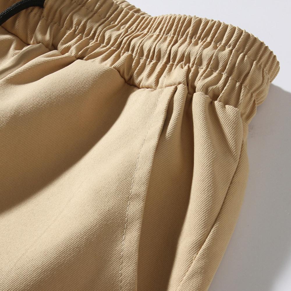 Nové pracovní oděvy kalhoty s mnoha kapsami pánské tkané kalhoty pro volný čas kalhoty se stahovací šňůrkou módní pánské kalhoty