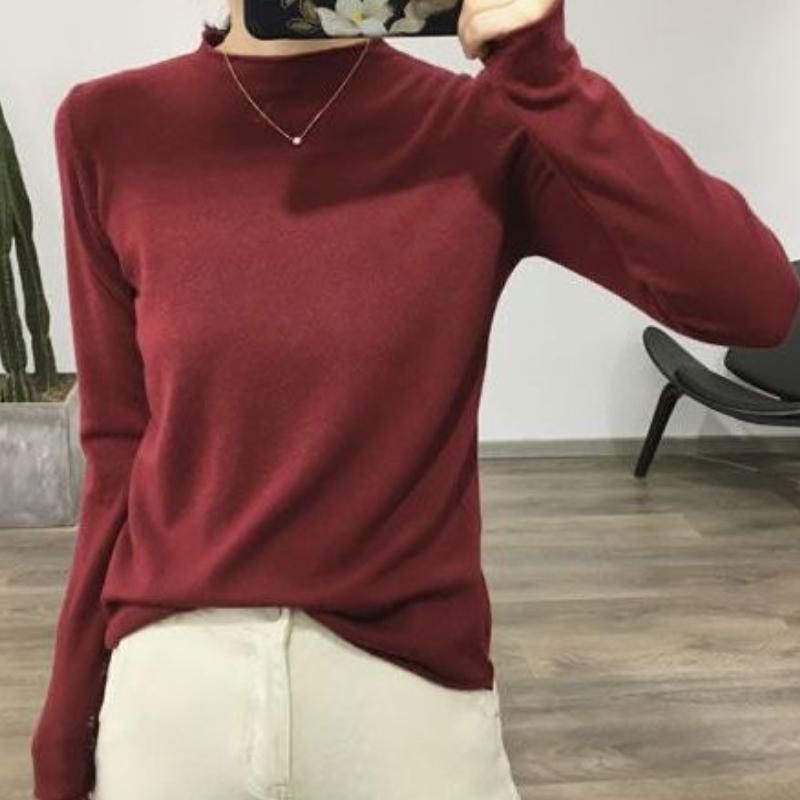 Für Schüler im Herbst und Winter kann das Tragen eines Strickpullovers als Innenschicht sie schlanker aussehen lassen.