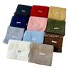 Solid color atmosphere versatile soft waxy wool blended knitted scarf women's autumn and winter white student wool scarf wholesale