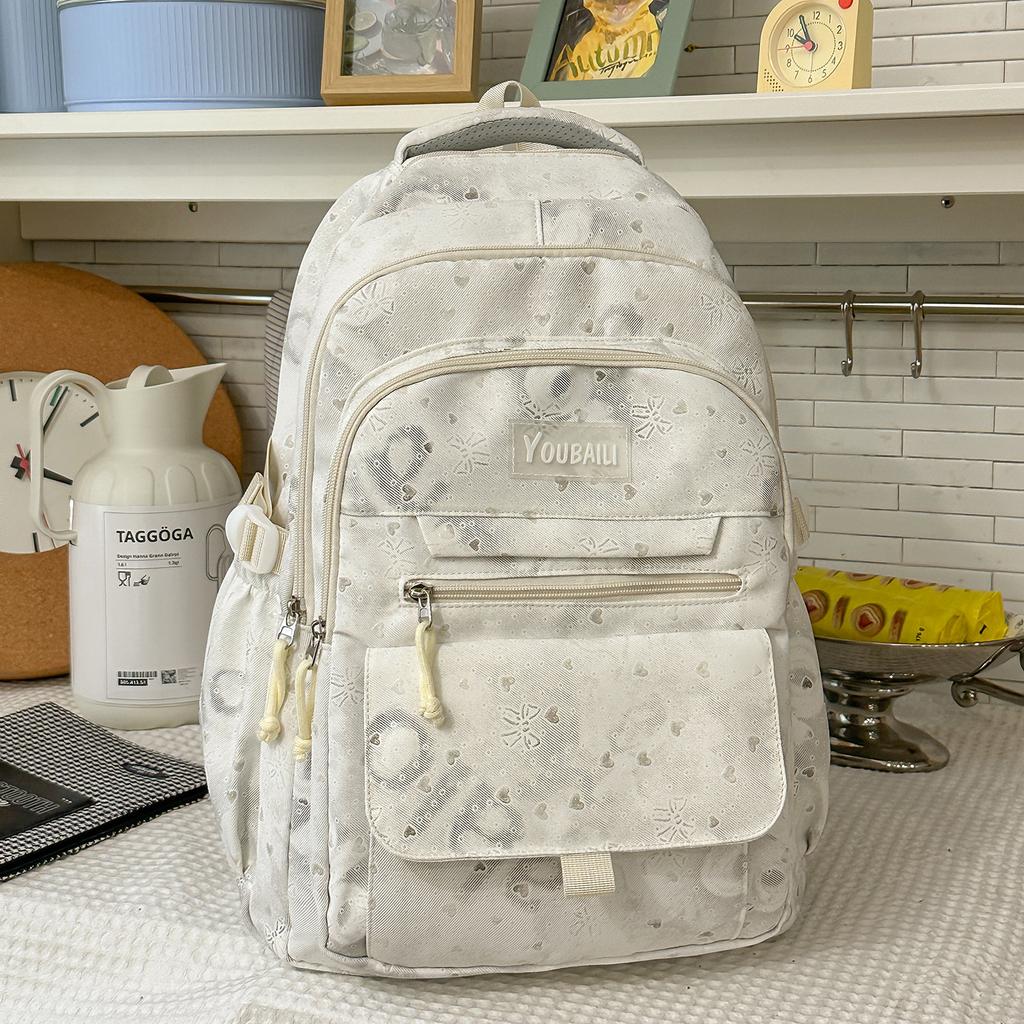Schoolbag Korean version of high-value bow backpack for junior high school students, large-capacity schoolbag, casual trend, cute backpack.