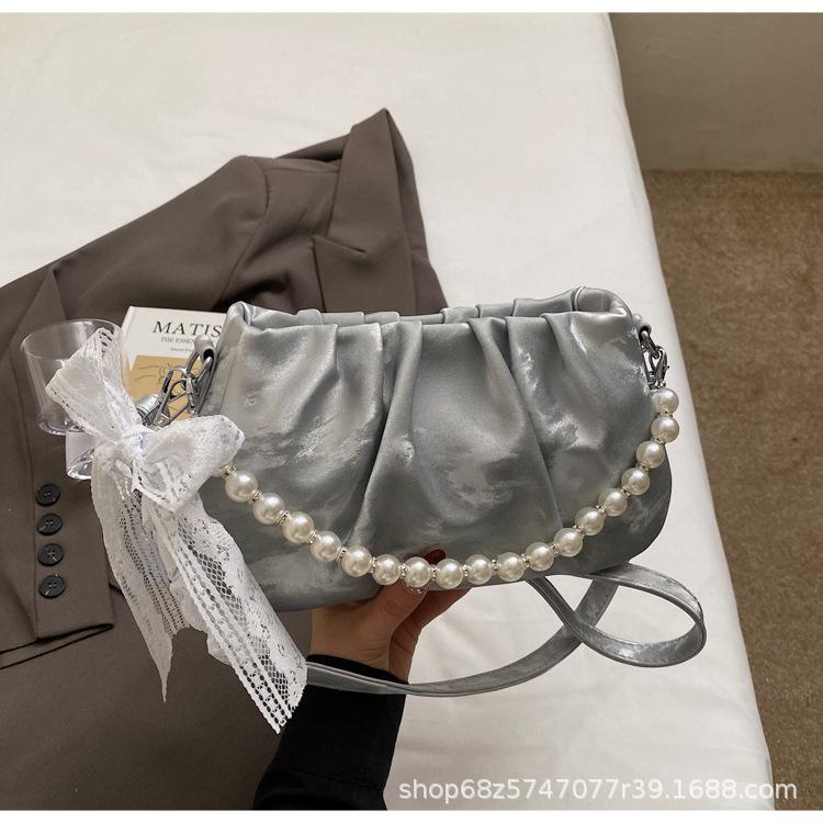 

2025 summer new super hot small bag women s fashion versatile niche design one-shoulder crossbody bag pleated cloud bag серебряный