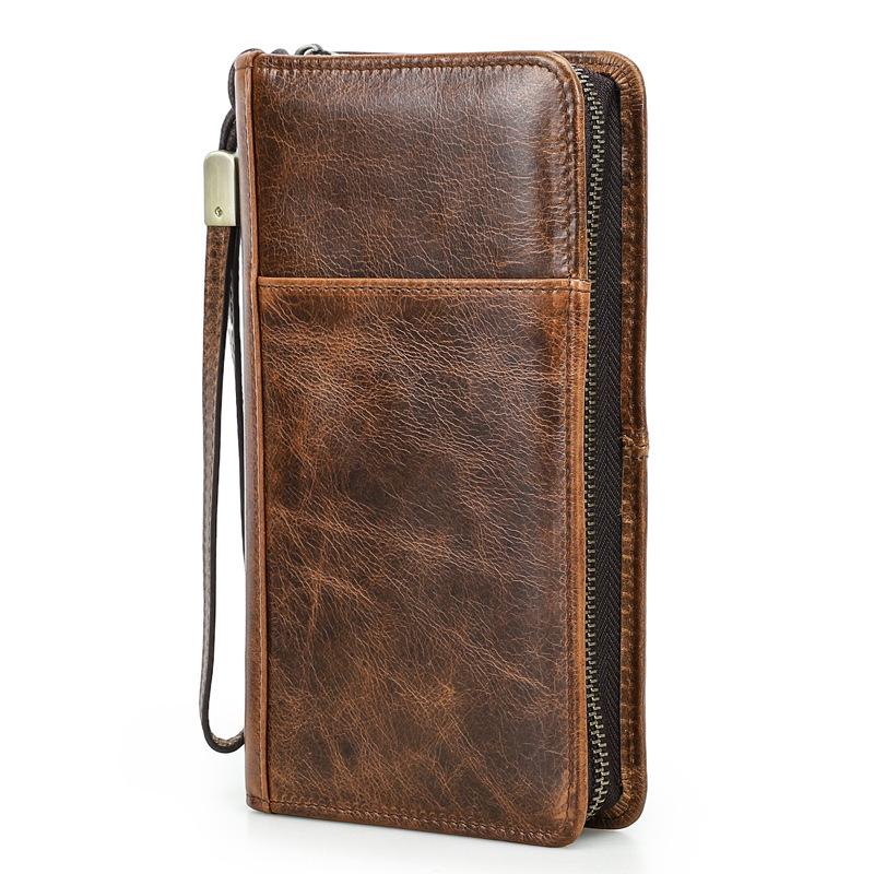

Black Angel RFID Passport Holder: Anti-magnetic, Multifunctional Genuine Leather with Zipper & Wrist Strap for Travel and Home Use. коричневий