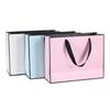 White Paper Jam Handbag Kraft Paper Thick Waterproof Frame Rivet Handle Gift Bag Cosmetic Clothing Store Portable Packaging Bags