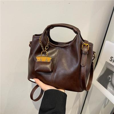 Bolsa de mão retrô de nicho, bolsa feminina casual para viagem, bolsa mensageiro, bolsa balde moderna e simples