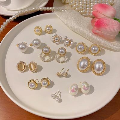 S925 sudraba adatas luksusa pērļu un kaķa acs akmens auskari sievietēm – elegants, viscaur pieskaņots dizains.