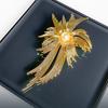 Mid-style golden firework brooch, high-end women's exquisite pearl brooch, niche design sense brooch, suit accessory