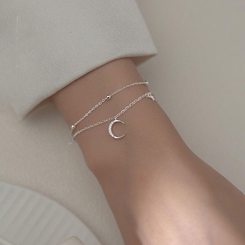 

Двухслойный браслет Звезда и Луна Женский Легкая Роскошь Высокий Класс Изысканный Мори Маленький Свежий и Сладкий Темперамент Руки, Инкрустированный Бриллиантами