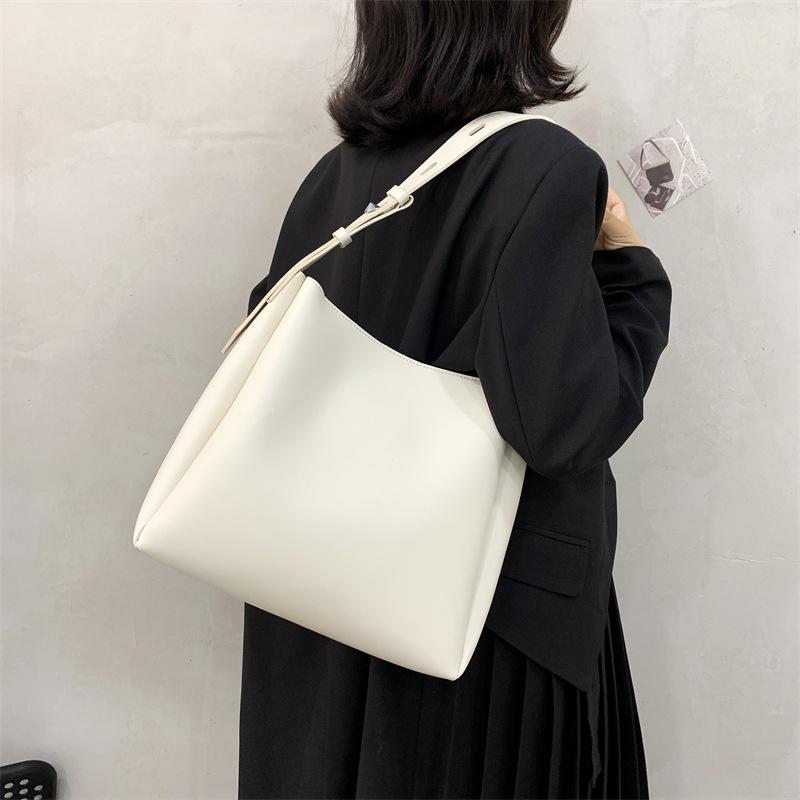 Women's bags, women's new retro commuter tote bags, fashionable and simple large-capacity versatile bucket bags