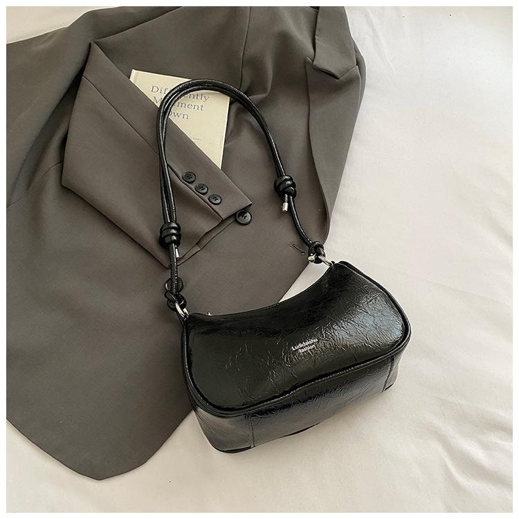 

Niche texture bag women s hand bag 2025 summer new simple high-end fashion single shoulder crossbody dumpling bag
