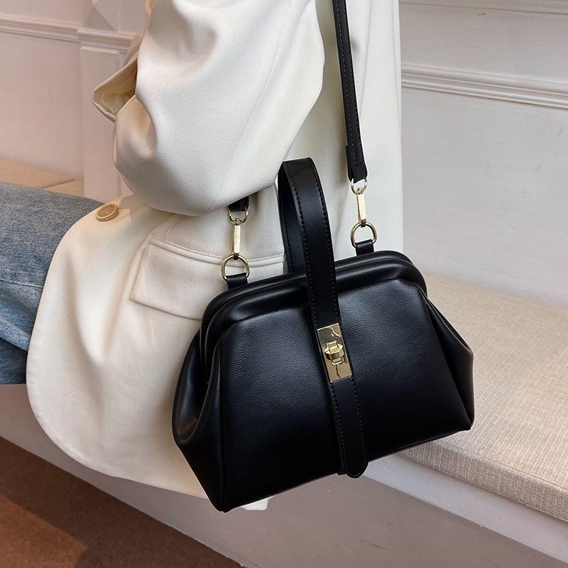 Elegant Vintage Shoulder Bag For Women Featuring Unique Saddle Shape Soft Material