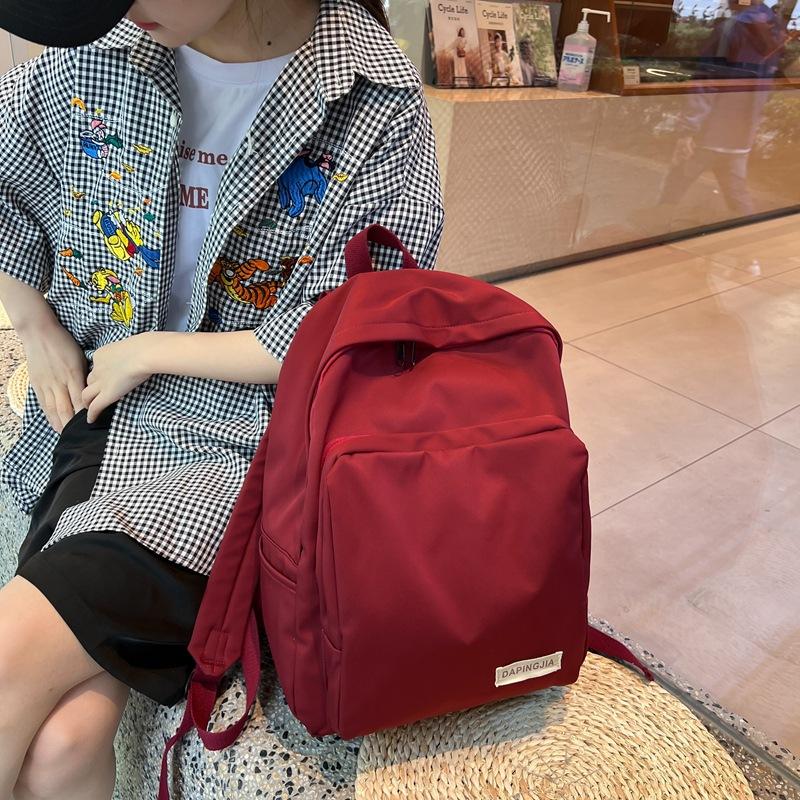 

College style labeling front pocket student schoolbag junior high school student large capacity simple backpack красный