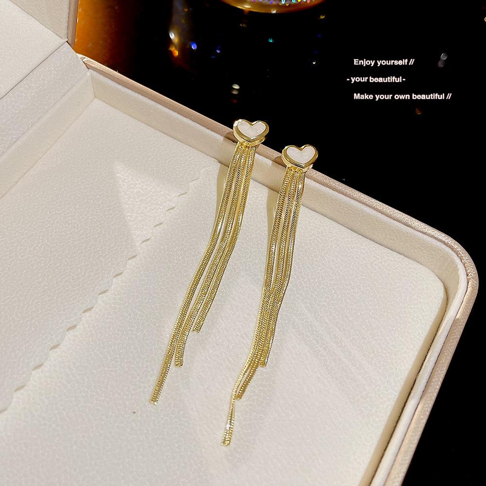 

Шикарные серьги-кисточки в форме сердца: Универсальный летний дизайн для женщин