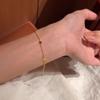 2026 Exquisite Gold Brushed Four-Leaf Clover Bracelet: High-End Chinese Design for Women