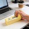 A long butter bread pressure toy that you can knead and squeeze. This is a slow-release toy with a honey cream flavor