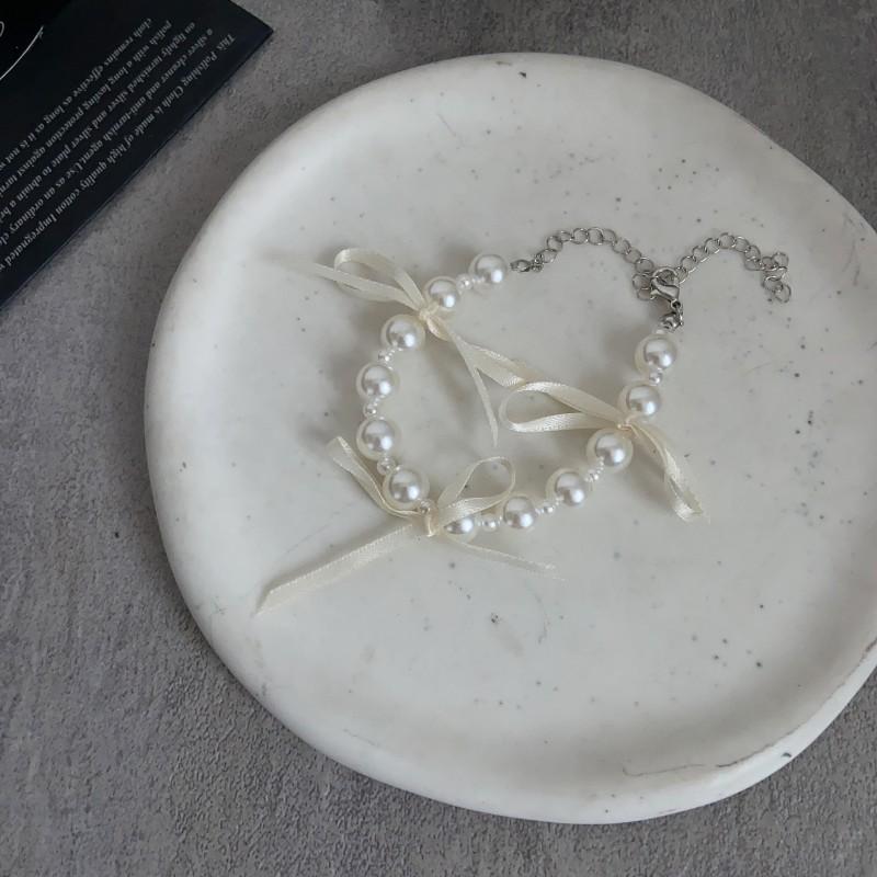 Нишевое светло-люксовое жемчужное колье серьги в стиле ins, сладкий, крутой, с черной лентой, бантом, жемчужная цепочка на ключицу, браслет