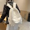 Fashion travel lightweight middle school college students class solid color backpack 2025 new simple niche design school bag