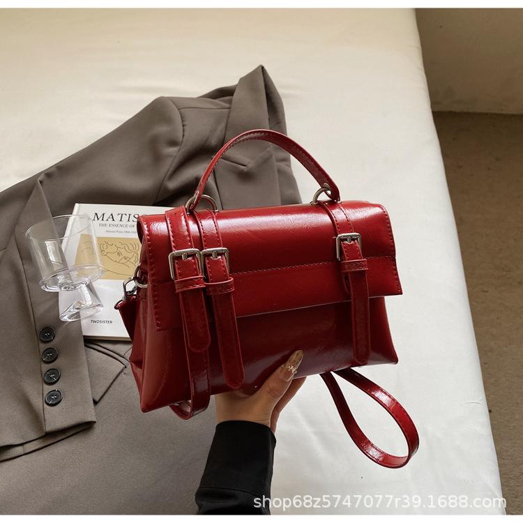 Retro preppy style large-capacity handbag women's 2025 pre-spring new Korean solid color shoulder bag textured messenger bag
