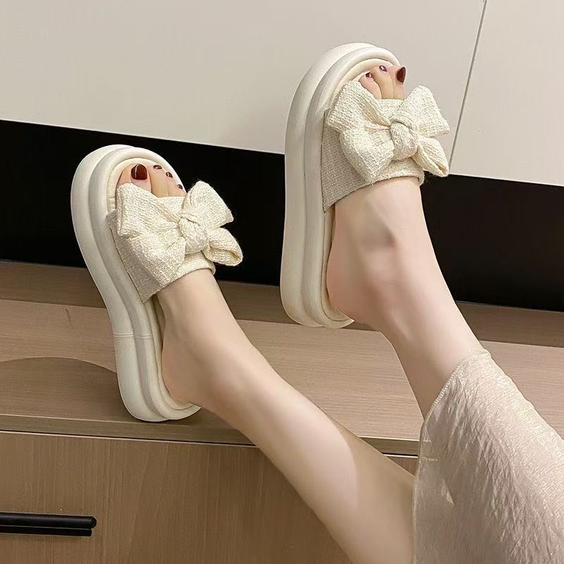 Bow Internet celebrity wearing versatile platform slippers 2025 new fairy style muffin non-slip beach sandals