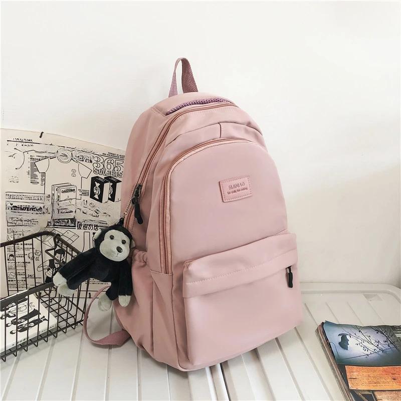 Sac à dos femme couleur unie femme multi-poches décontracté homme sac de voyage cartable de haute qualité pour adolescente livre sac à dos