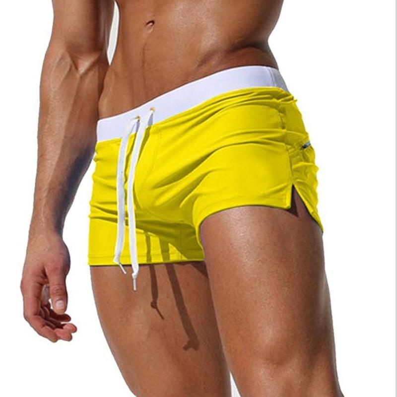 Men's solid color sexy and fashionable back pocket design, beach breathable quick-drying pants, boxer beach pants, swimming trunks.