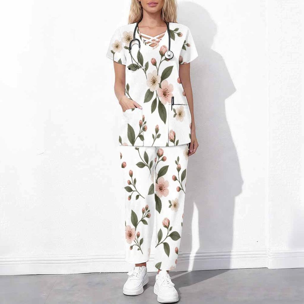 Women Plus Size White Floral Printed Scrub Set Cutout Neck Short Sleeve Pocket Top Long Pants