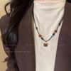 Fashion Temperament Accessories Tiger's Eye Stone Woven Leather Rope Necklace Autumn and Winter New Retro Sweater Chain Jewelry