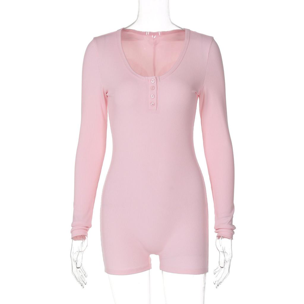 Combinaison moulante longue à manches longues taille haute rose et noire avec fermeture à boutons pour le sport