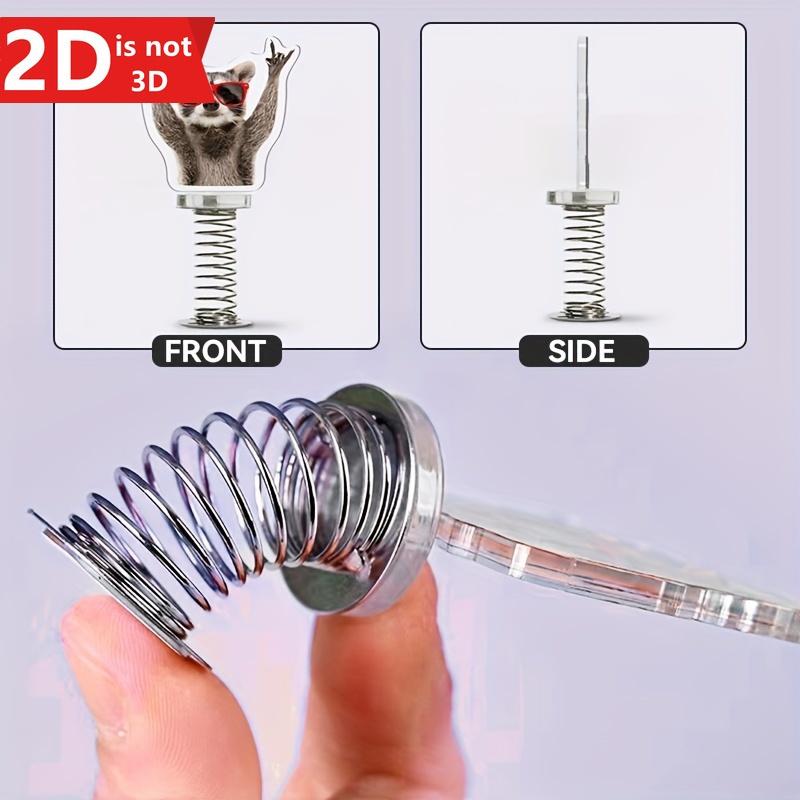 Cute 2D Swinging Raccoon, a spring-driven decoration for desktops and car interiors.