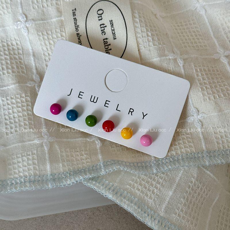 

Нишевый стиль Женский Дофаминовый цвет Уникальный Циркон, не повреждающий уши Dark Bean Stud Earrings Suit