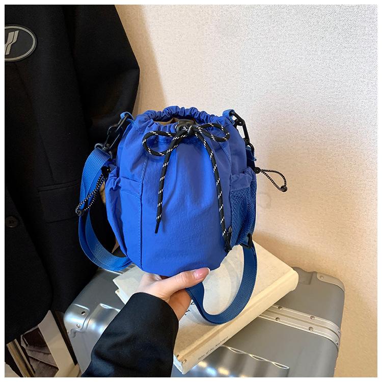 Canvas-Tasche Damen 2025 neue trendige Marke Handy-Tasche Freizeit Sport Reise Umhängetasche kleine Eimertasche