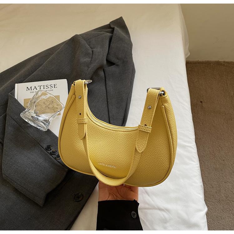 

Premium texture small bag women s 2025 new niche versatile messenger bag popular one-shoulder underarm dumpling bag жовтий