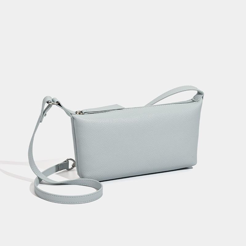 Spring new simple and versatile shoulder messenger bag PU texture pillow bag versatile commuter armpit bag