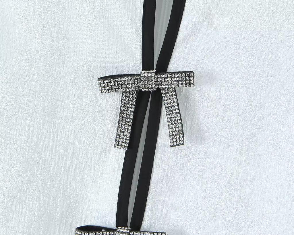 2025 Spring Women's Fashion Bow Textured Jacquard Mini Skirt: Euro-American Style