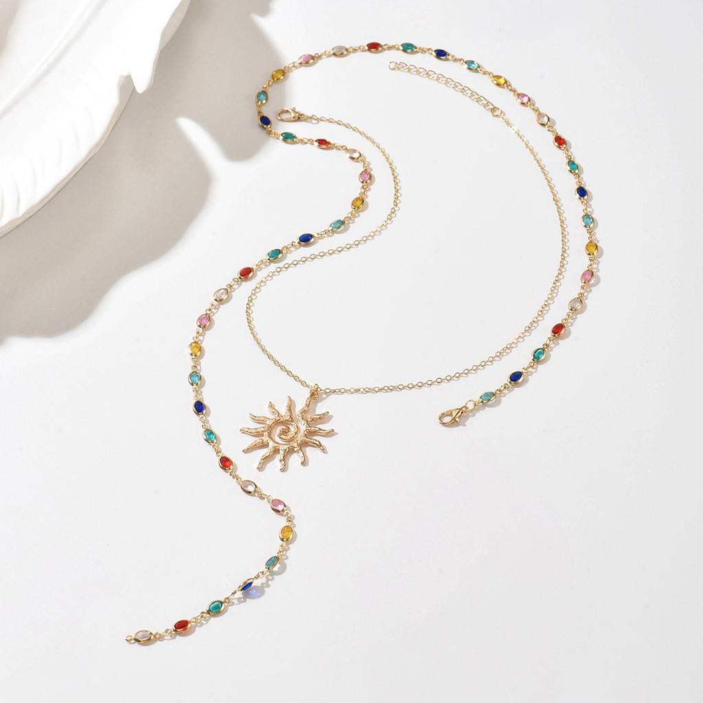 European and American sun pendant necklace light luxury high sense tassel eye long chain color cold wind collarbone chain