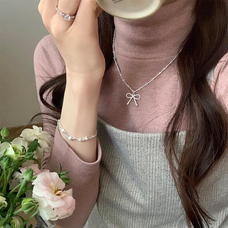 Elegant Silver Bow Knot Necklace: Versatile, Light Luxury Design for Women