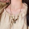 Retro Chinese Tassel Necklace: Unique Ethnic Style Women's High-End Clavicle Chain.
