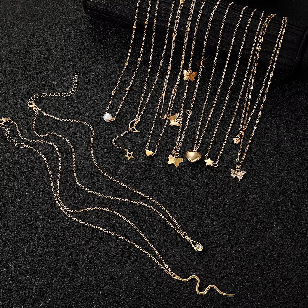 9 Pcs Multi-layered Gold Color Necklace Set for Women Fashion Zircon Heart Butterfly Star Moon Snake Pendant Necklaces Set