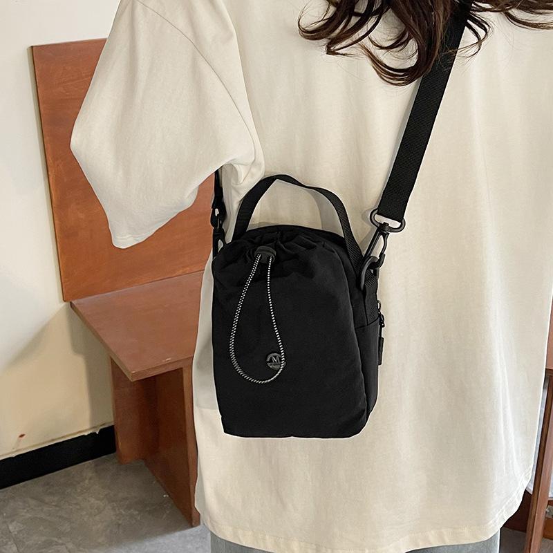 Kettle bag waterproof casual shoulder bag women's tide brand versatile mobile phone bag fitness walking messenger bag water cup cloth bag men