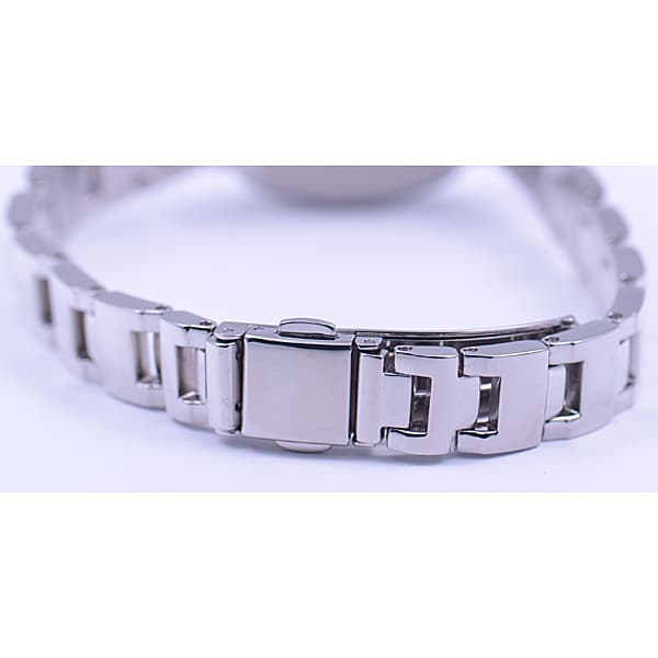 Citizen KP1-110-91 femmes ( Montre REGUNO Solar-Tech Femme) Montre Tonneau analogique en acier inoxydable argenté