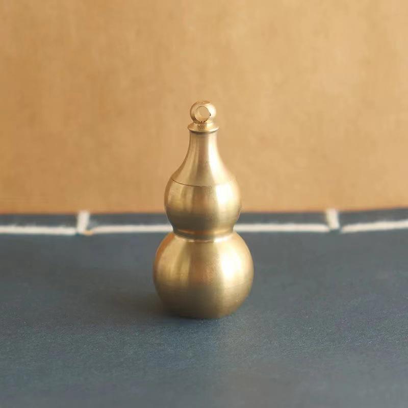 Glazed Brass Gourd Pendant with Etched Characters and Five Emperor Coins