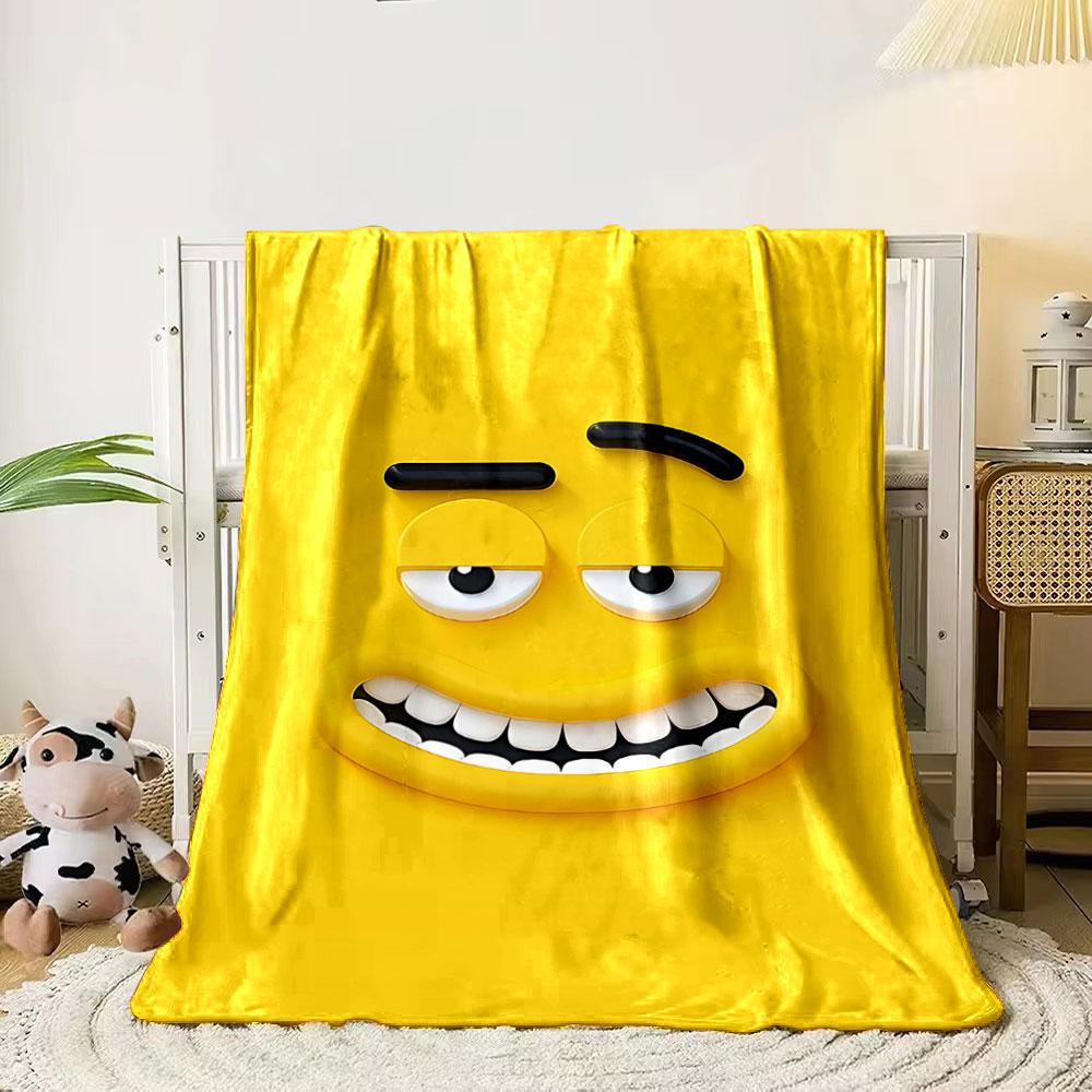 A playful yellow face with raised eyebrows, squinty eyes, and a grin. for all seasons blanket lunch break throw gift 80cm x 120cm