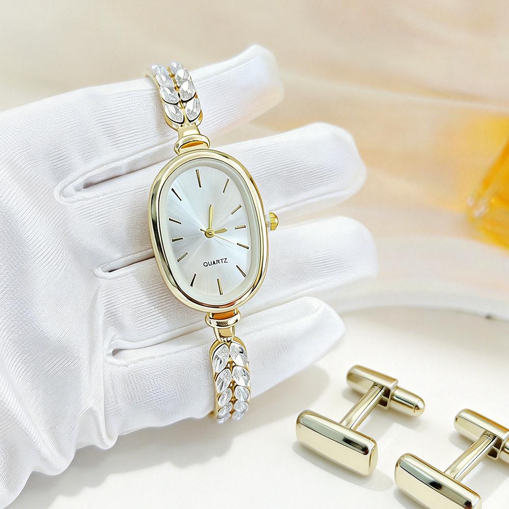 Elegante Damen-Gold-Diamant-Armbanduhr - Ovales Zifferblatt Quarz-Armbanduhr